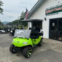 Introducing the Evolution Classic 4 Plus in a striking light green finish, available at Kelley's Custom Carts. This vibrant cart is more than just a ride - it's a statement of style and functionality. The Classic 4 Plus combines the timeless appeal of traditional golf carts with the advanced features of modern electric vehicles. It offers a smooth and comfortable ride, whether you're on the golf course, navigating your neighborhood, or exploring off-road trails. But the Classic 4 Plus isn't just about performance - it's also about comfort and convenience. With its spacious seating, easy-to-use controls, and ample storage space, it's designed to make every ride enjoyable. But the customization doesn't stop there. We offer a range of options and accessories that allow you to tailor the Classic 4 Plus to your specific needs and preferences. To discover all the possibilities, we invite you to call us or stop by Kelley's Custom Carts. Our team would be delighted to help you explore all the features and options of the Classic 4 Plus. Experience the perfect blend of tradition and innovation with the Evolution Classic 4 Plus - where style meets functionality.
